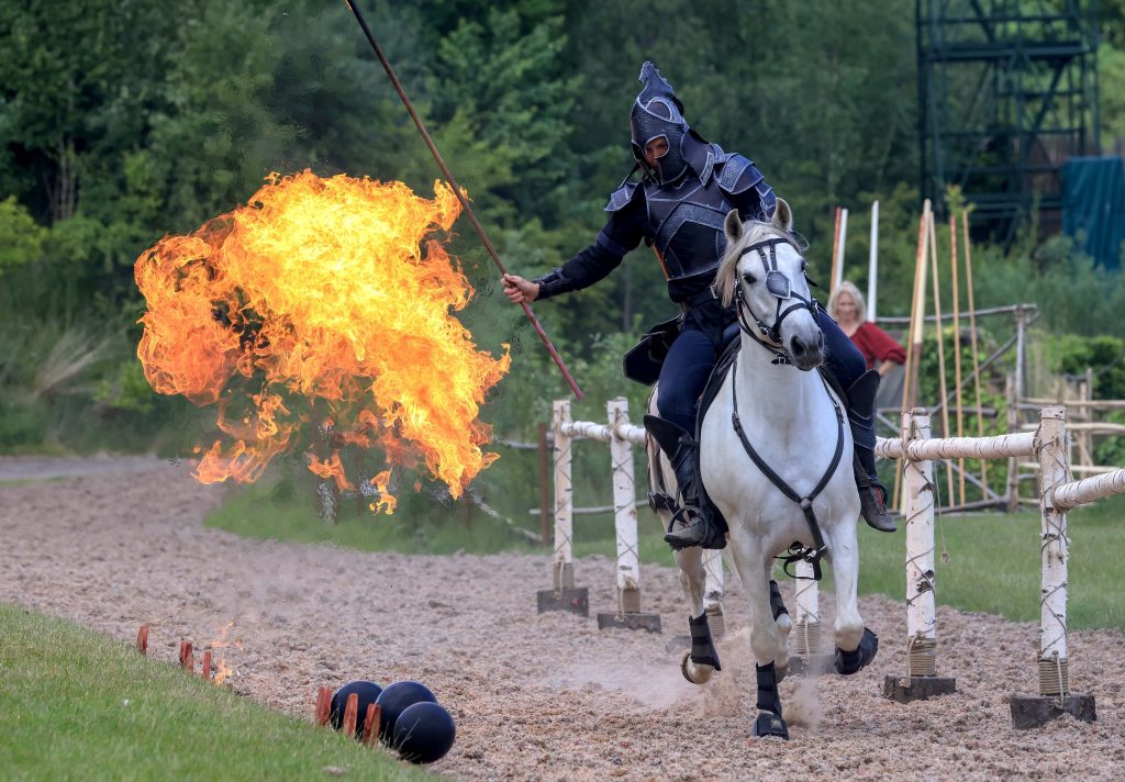 Mounted Viking warrior performing with fire during Land of the Vikings at Kynren – The Storied Lands.