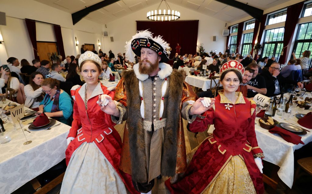 Historical characters entertaining guests during the Time Travellers' Feast at Kynren – The Storied Lands.