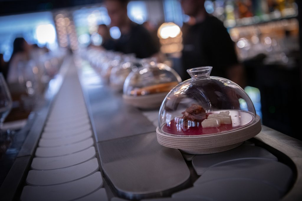 Artisan cheese and accompaniments served under a glass dome on the interactive cheese belt at Blacks Corner, Culture House in Sunderland.